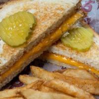 Emma'S Grilled Cheese · Classic grilled cheese garnished with pickles.