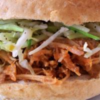 Pulled Pork Sandwich Combo · Pull Pork Sand,
Includes one side and drink.
Slaw optional