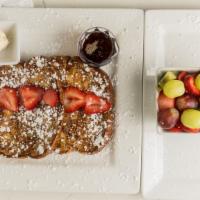Vegan French Toast · (2) Fluffy Challah Slices of Bread (Made with Plant-Based Eggs), Topped with Fresh Strawberr...
