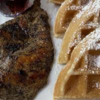 Chicken & Waffles · Crispy waffle with our famous blackened chicken breast.