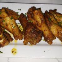 Marvin'S Baked Wings · Wings twice baked and cooked to perfection with our own signature sauce.