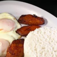 Cuban Breakfast · Two fried eggs, white rice and sweet plantains.