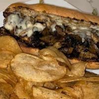 Chicken Philly · Grilled chicken, portobello mushrooms, caramelized onions, provolone & mayo on a grilled hoa...