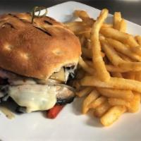 Portobello Melt · Grilled mushrooms, roasted red peppers, caramelized onions, balsamic vinegar & provolone on ...