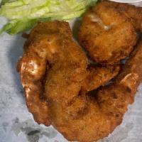 Coconut Shrimp · Lightly breaded shrimp with sweet chili sauce.