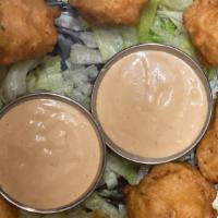 Conch Fritters · 5 pieces of conch fritters, serve with Bella Sauce