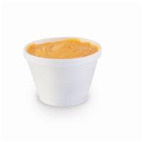 Side Jalapeño Cheese Sauce · You can dip absolutely anything our spicy  Jalapeno Cheese Sauce!