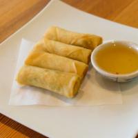 Thai Veggies Spring Roll · Fried vegetables rolls wrapped in rice paper served with dipping sauce.