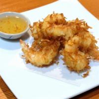 Coconut Shrimp · Juicy prawns lightly battered with sweet coconut flakes and fried to a crisp.