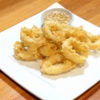 Fried Calamari · Crispy calamari served with dipping sauce and crushed peanut.