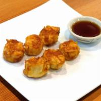 Shrimp Fried Dumpling · Served with dipping sauce.