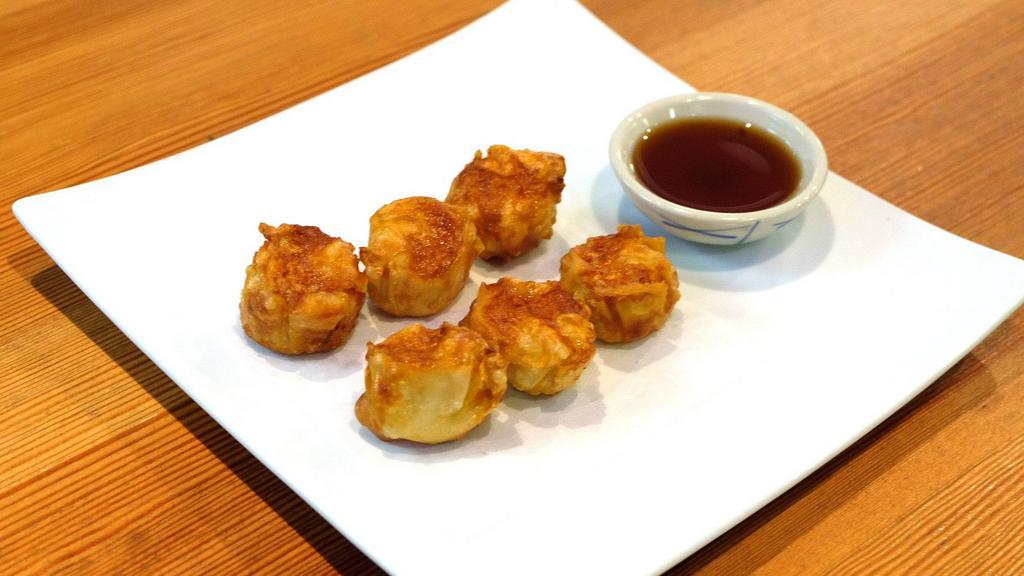 Shrimp Fried Dumpling · Served with dipping sauce.