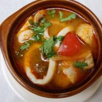 Tom Yum Soup · Thai spicy soup with mushrooms, lemongrass, lime juice, scallions and cilantro. (Mild Spicy)