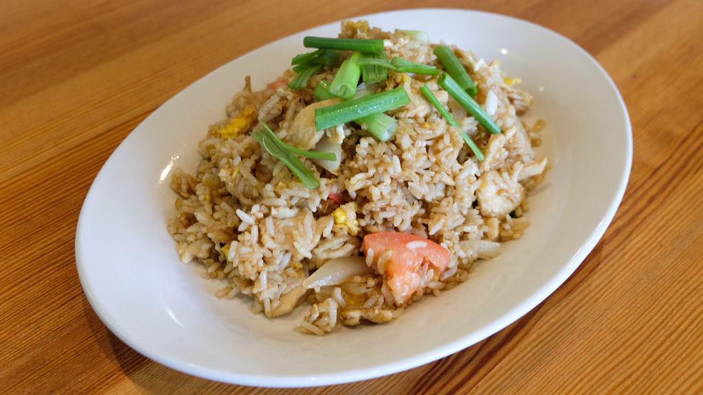 Fried Rice · Rice stir-fried with egg, onions, tomato and scallions