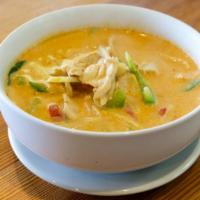Red Curry · Bamboo shoots, bell pepper, coconut milk and basil. Served with steamed white rice.
(Mild Sp...