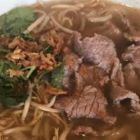 Beef Noodle Soup · Beef soup with bean sprout cilantro basil thin sliced beef steak and garlic.