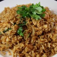 Basil Fried Rice · Jasmine rice egg onions bell pepper clear noodle roasted peanuts with fresh basil.