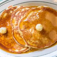 Pancakes  · three buttermilk pancakes, choice of protein