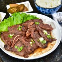 Marinated Galbi Short Ribs · Served with rice or steamed veggies.