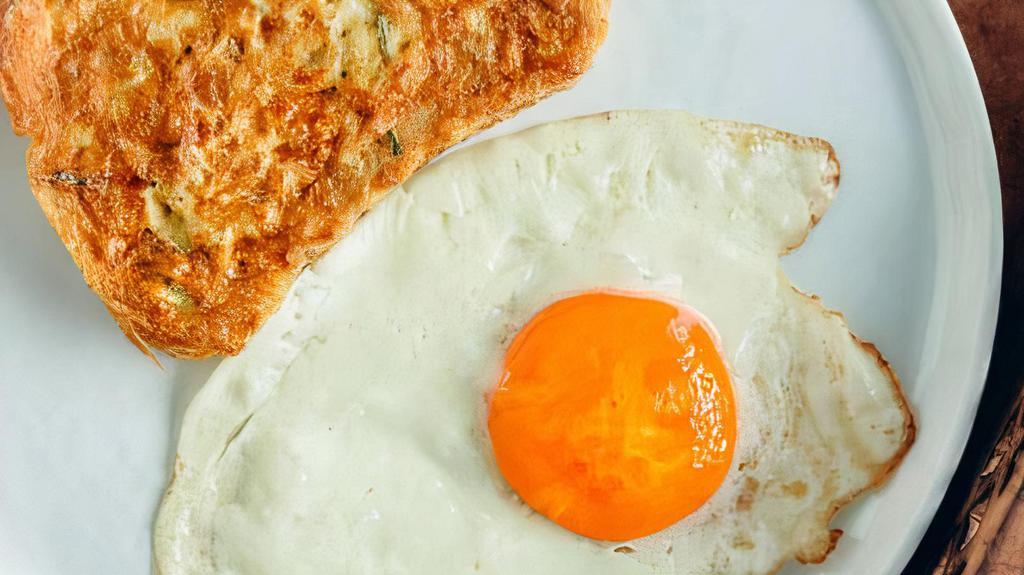 Breakfast # 1 / Desayuno  # 1  · 2 Eggs, Toast, Coffee / 2 Huevos, Tostada, Café.