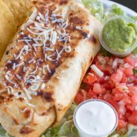 Burritos · Large Flour tortilla filled with beans, rice, your choice of meat, served with lettuce, crea...