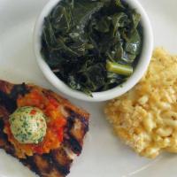Blackened Mahi-Mahi · grilled to perfection served with creole butter. and choice of two farm fresh sides