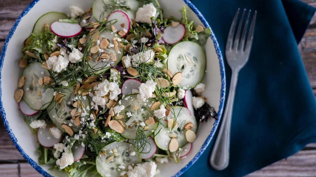 Lemon Garden Party (Gf) · arugula and mixed greens tossed in lemon herb dressing, topped with shaved cucumbers & radishes, feta cheese crumbles and toasted & sliced almonds