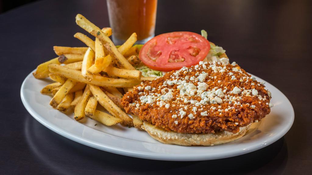Buffalo Chicken Sandwich · panko crusted chicken breast slathered in Joe's regular sauce, topped with crumbled blue cheese, shredded lettuce, tomato and mayo