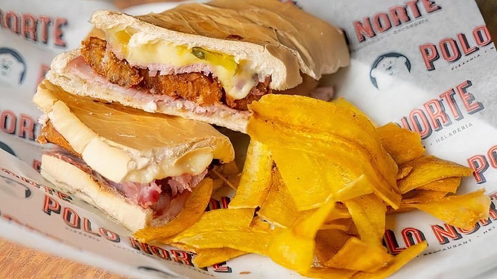 Croqueta Preparada · 3 croquettes, ham, cheese, pickles and mustard on pressed Cuban bread.