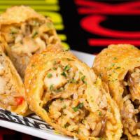 Chicken Rolls · Stuffed with chicken,corn,veggie and a mix of shredded jack and cheddar cheese.