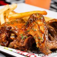 Fried Chicken Wing Dinner · Includes 2 sides.