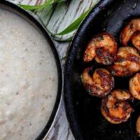 Mtv Shrimp & Grits (6 Shrimp) · Comforting staple featuring grilled marinated jumbo shrimp, served with grits and rich red c...