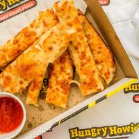 3 Cheeser Howie Bread® (8) · Buttered garlic bread sticks topped with Parmesan, cheddar and mozzarella. Your choice of di...