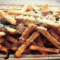 Truffle Fries · Fries topped with truffle oil, freshly shaved parmesan, dried Italian herbs with garlic aiol...