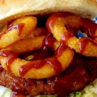 Bbq Shrimp Burger · Tangy BBQ sauce topped with crispy onion rings. Served with your choice of two side.