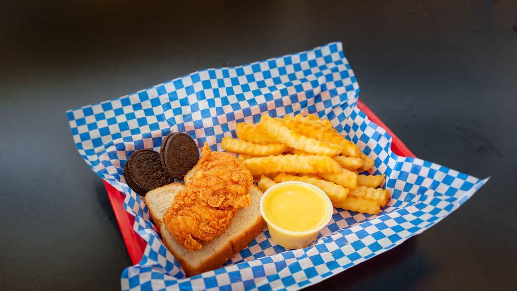 Chicken Tender Kids Meal · Includes one jumbo chicken tender, French fries, cookies, white bread, children's drink and a dipping sauce.