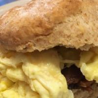 Breakfast Egg, Cheese And Meat Sandwich · Scrambled egg with cheddar/jack cheese and your choice of meat (either bacon, turkey bacon, ...