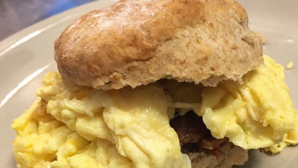 Breakfast Egg, Cheese And Meat Sandwich · Scrambled egg with cheddar/jack cheese and your choice of meat (either bacon, turkey bacon, country sausage, chicken sausage, veggie sausage or ham) on a biscuit or toast