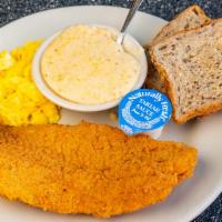 Fried Fish & Grits · Basa catfish filet deep-fried and served with two eggs any style, grits, and toast or multi-...