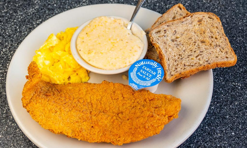 Fried Fish & Grits · Basa catfish filet deep-fried and served with two eggs any style, grits, and toast or multi-grain biscuit. 

The consumption of raw or undercooked foods such as meat, fish and eggs, which may contain harmful bacteria, may cause serious illness or death.