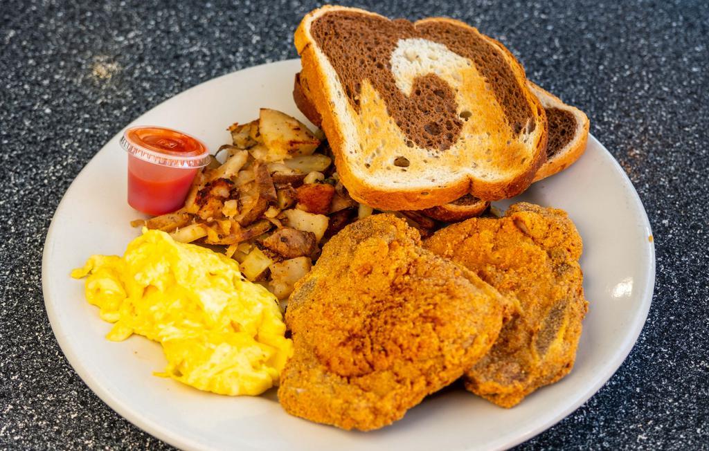 Pork Chops & Eggs · Two pork chops, grilled or fried with two eggs any style, grits and choice of toast or multi-grain biscuit. 

The consumption of raw or undercooked foods such as meat, fish and eggs, which may contain harmful bacteria, may cause serious illness or death.