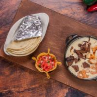Zama'S Texas Dip · Large bowl of our delicious, mouthwatering melted cheese with grilled steak, chicken, and sh...