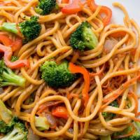 Vegetable Lo Mein Noodles · Thick lo mein noodles stir fried and tossed with napa cabbage carrots and onions.
