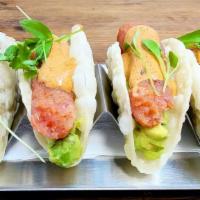 Fortuna Tacosito · sushi grade ahi tuna puree, guacamole, chipotle mayo, petite cilantro on 4 Gyoza Taco Shells.