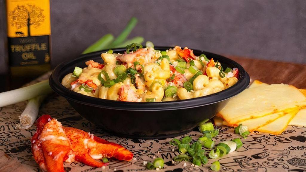 Lobster Mac & Cheese · Lobster, Muenster Cheese, finished with Lobster Cream, White Truffle Oil, and Scallions.