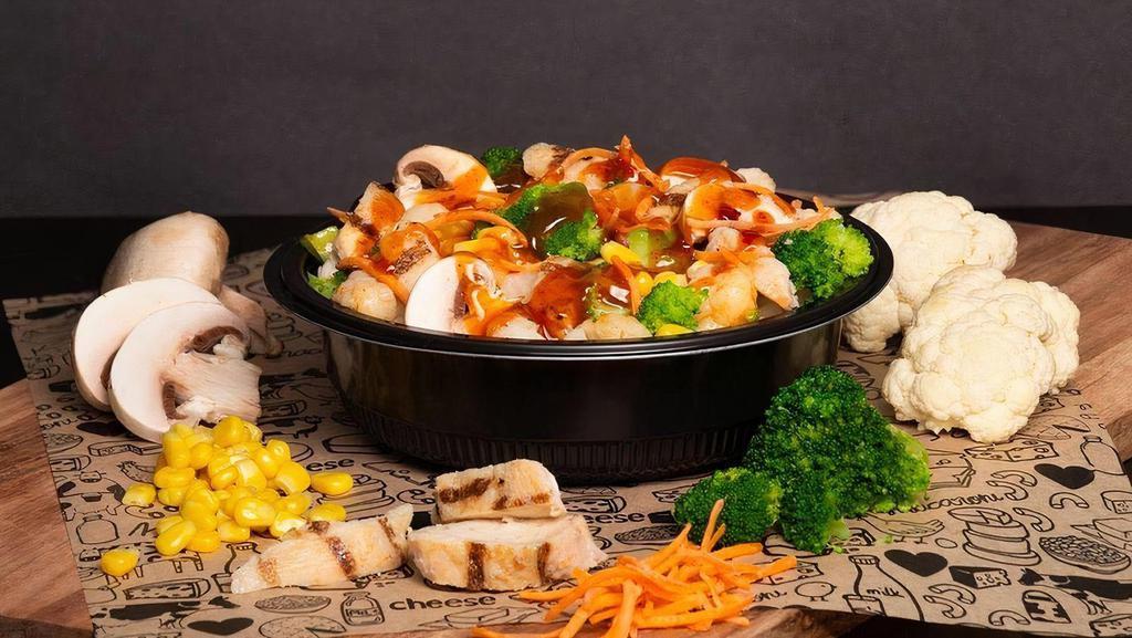 Skinny, Sweet & Spicy · Broccoli and Cauliflower as your base-Grilled Chicken, Sesame Ginger Sauce, Mango Habanero Sauce, Mushrooms, Carrots, Corn and Scallions.