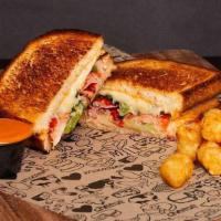 Lobster Grilled Cheese · Sourdough bread, Lobster, muenster cheese, finished with lobster cream, white truffle oil, a...