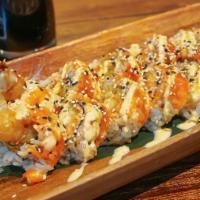 Shrimp Tempura Roll · Shrimp tempura, krabstick, avocado, spicy mayo, sesame seeds and masago topped with eel sauce.