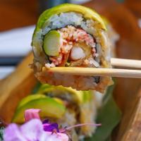 Dragon Roll · Tempura shrimp, krab meats, asparagus, masago, spicy mayo topped with avocado and eel sauce.