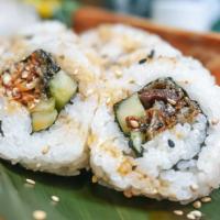 Salmon Skin Roll · Fried salmon skin, cucumber and sesame seeds and served with eel sauce.